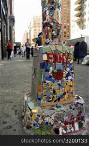 Mosaic work on a lamppost, New York City, New York State, USA