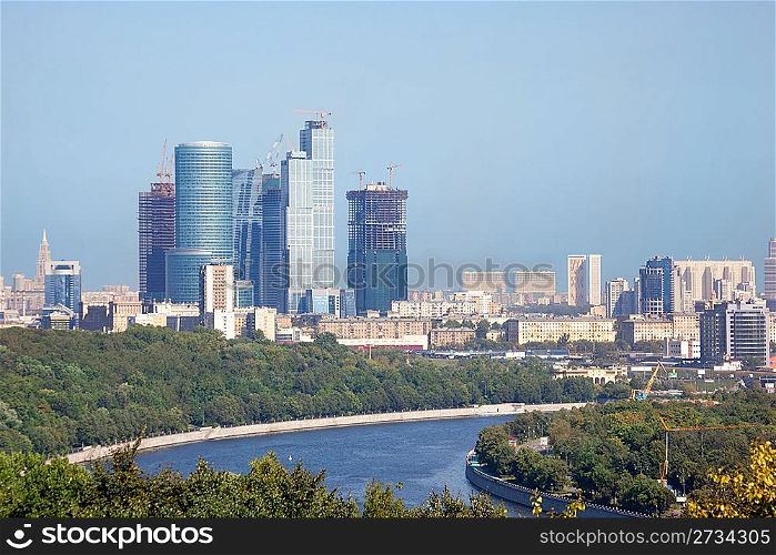 Moscow city urban view. construction of high building scraper skyscraper. building of business centre. Buildings from glass and concrete. Moscow river on near plan