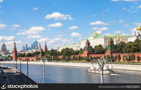 Moscow cityscape - view of Kremlin and Sofiyskaya Embankments of Moskva River in sunny summer day