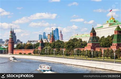 Moscow cityscape - view of Moskva River, embankment, Kremlin, Moscow City district in sunny summer day