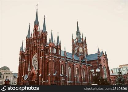 Moscow Gothic Catholic cathedral against the autumn sky