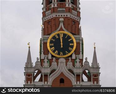 Moscow Kremlin Main Clock named Kuranti on Spasskaya Tower 12 hours . Red Square. Moscow Kremlin Main Clock named Kuranti on Spasskaya Tower 12 hours . Red Square.