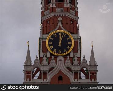 Moscow Kremlin Main Clock named Kuranti on Spasskaya Tower 12 hours . Red Square. Moscow Kremlin Main Clock named Kuranti on Spasskaya Tower 12 hours . Red Square.