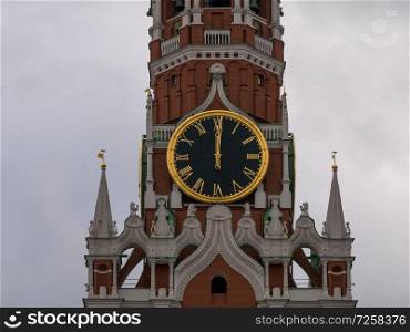 Moscow Kremlin Main Clock named Kuranti on Spasskaya Tower 12 hours . Red Square.