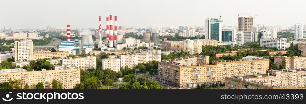 Moscow, Russia - 22 June, 2016: Moscow panoramic view from above - avenues, residential area, Sberbank of Russia office center building, power plant, construction cranes and new buildings. High angle view, in Moscow, Russia