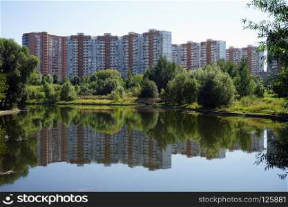 MOSCOW, RUSSIA - CIRCA JULY 2018 Ochakovka river and apartment buildings