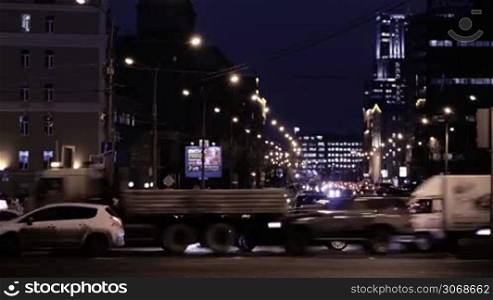 MOSCOW, RUSSIA - DECEMBER 12, 2013: Timelapse of city traffic at night on Academician Sakharov Prospect
