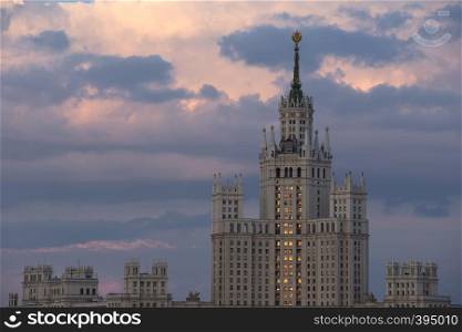 Moscow Russia on against dramatic sunset sky. Building of Stalin's era.