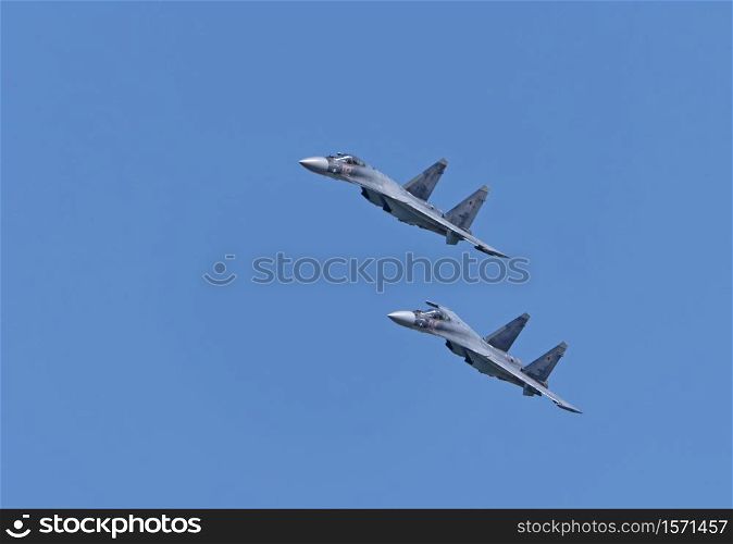 "Moscow Russia Zhukovsky Airfield 31 August 2019: Aerobatic teams "Falcons Of Russia" on planes Su-30 of the international aerospace salon MAKS-2019.. Moscow Russia Zhukovsky Airfield 31 August 2019: Aerobatic teams "Falcons Of Russia" on planes Su-30 of the international aerospace salon MAKS-2019"