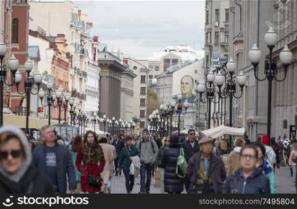 MOSCOW - SEPTEMBER 27: Walk people along Old Arbat Street on September 27, 2010 in Moscow, Russia.. MOSCOW - SEPTEMBER 27: Walk people along Old Arbat Street on September 27, 2010 in Moscow, Russia