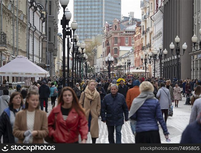MOSCOW - SEPTEMBER 27: Walk people along Old Arbat Street on September 27, 2010 in Moscow, Russia.. MOSCOW - SEPTEMBER 27: Walk people along Old Arbat Street on September 27, 2010 in Moscow, Russia
