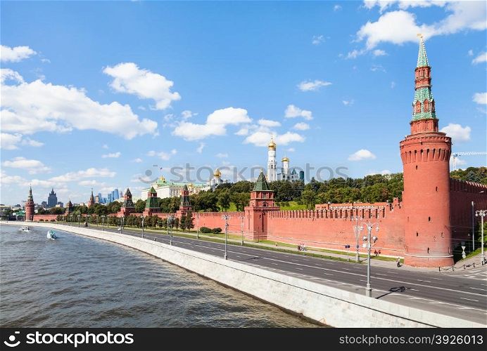 Moscow skyline - Beklemishevskaya Tower and Red Kremlin Walls, The Kremlin embankment, Kremlin churches and buildings in Moscow in sunny summer day