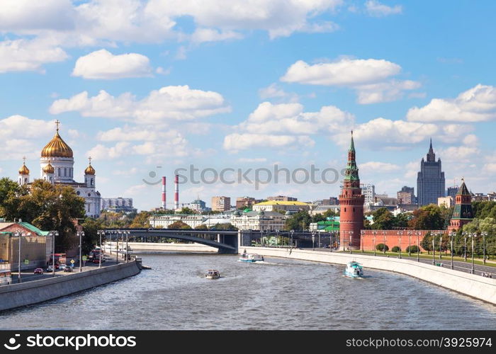 Moscow skyline - Bolshoy Kamenny Bridge on Moskva River, Embankments, Kremlin Towers, Cathedral of Christ the Saviour in Moscow, Russia in summer day