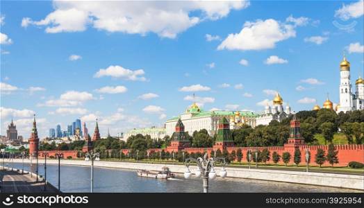 Moscow skyline - view of Kremlin embankment from Moskva River in sunny summer day