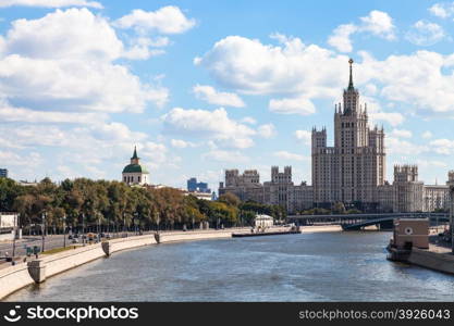 Moscow skyline - view of Moskvoretskaya Embankment of Moskva River, Bolshoy Ustinsky Bridge and Kotelnicheskaya Embankment High-Rise Building in Moscow, Russia in summer day