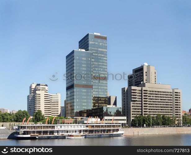 Moscow World Trade Centre on Krasnopresnenskaya Embankment. View from the Moscow River. Sunny summer day.