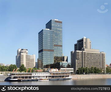 Moscow World Trade Centre on Krasnopresnenskaya Embankment. View from the Moscow River. Sunny summer day.