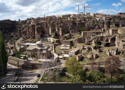 Mosque and church in Guzelurt in Cappadocia, Turkey