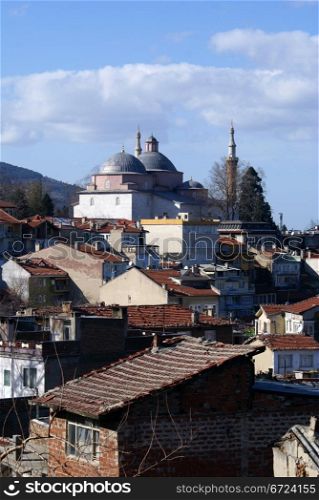 Mosque Eshil Jami and houses in Bursa, Turkjey
