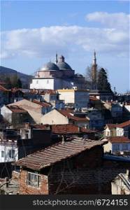 Mosque Eshil Jami and houses in Bursa, Turkjey