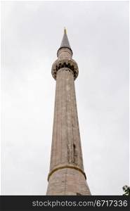 Mosque minaret in Istanbul in overcast day