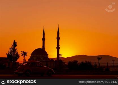 Mosque silhouette at sunset in Turkey