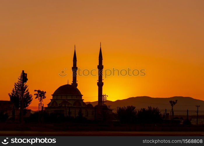 Mosque silhouette at sunset in Turkey