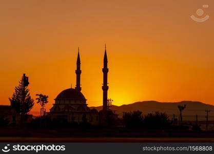 Mosque silhouette at sunset in Turkey