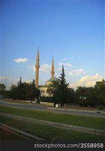 Mosque with a two high towers against blue sky