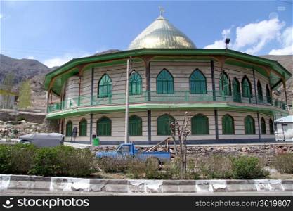 Mosque with golden dome in iranian village, Iran