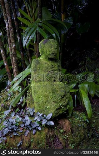 Moss covered statue in Bali