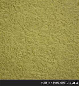 moss green Japanese Momi Washi paper background featuring a rough, evenly textured surface formed by crinkling the paper during the manufacturing process