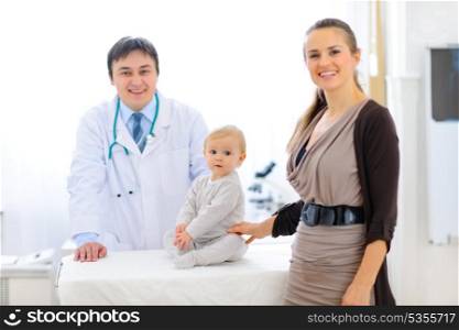 Mother and baby on examination at pediatric cabinet&#xA;