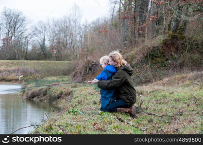 Mother and child fishing together