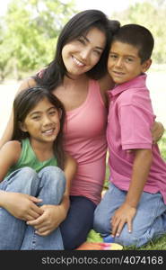 Mother And Children In Park