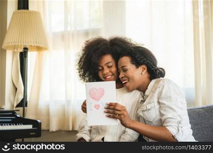 Mother and daughter are happy and relaxed, staying at home concept