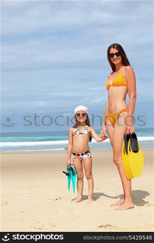 Mother and daughter at the beach.