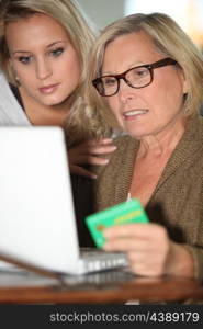 Mother and daughter calculating social security