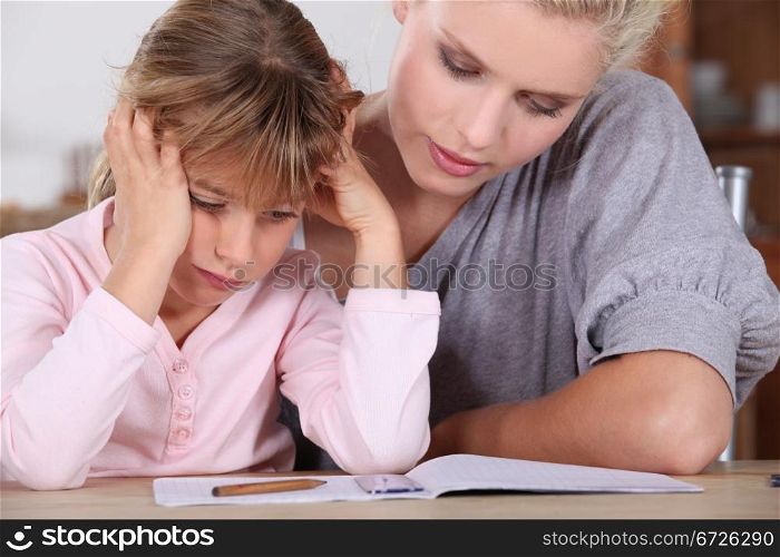 Mother and daughter doing homework