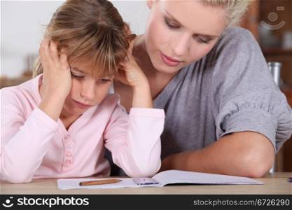 Mother and daughter doing homework