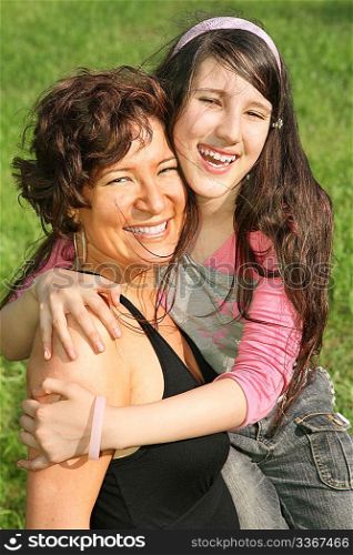 mother and daughter embrace each other 2