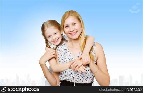 Mother and daughter. Happy family of smiling mother and daughter
