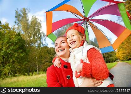 Mother and daughter having fun outdoors