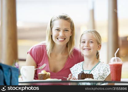 Mother And Daughter Having Lunch Together At The Mall