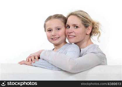 Mother and daughter in a studio