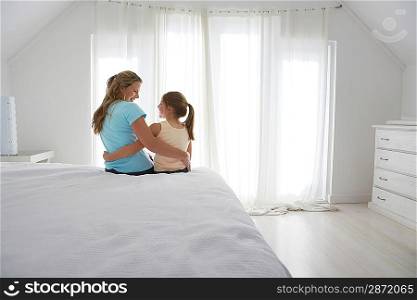 Mother and Daughter in Bedroom