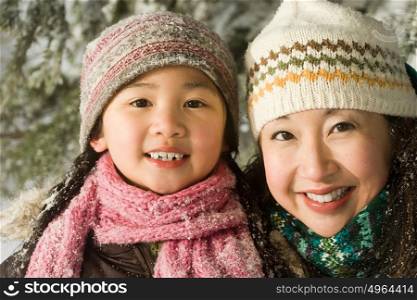 Mother and daughter in hats