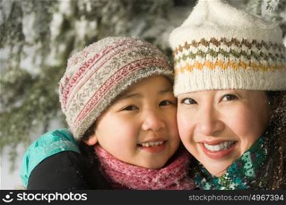 Mother and daughter in hats