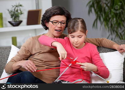 Mother and daughter knitting