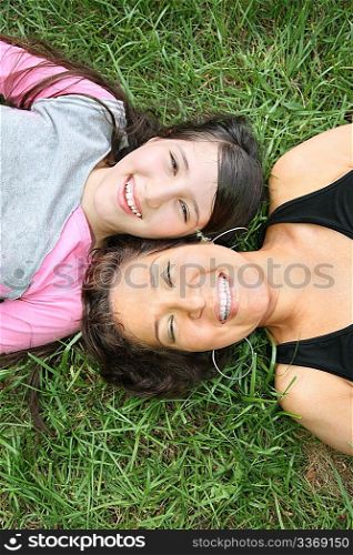 mother and daughter on the grass
